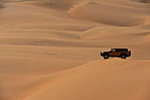 4 Wheel Drive Going Across Sand Dunesliwa, Abu Dhabi, Uae