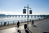 Europe, France, Bordeaux, riverside gironde cyclist