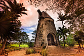 Old windmill on the grounds of the Damoiseau Distillery, remains of what was once used to power the sugar mill, Le Moule on Grande-Terre; Guadeloupe, French West Indies