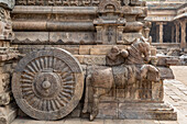 Close-up of horse drawn chariot carved in stone outside Dravidian Chola era Airavatesvara Temple; Darasuram, Tamil Nadu, India