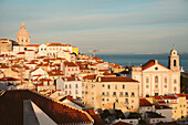 The City of Lisbon's Old Quarter, Alfama, at sunset; Lisbon, Portugal