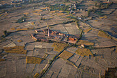 A brick factory among farms.