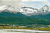 Tierra del Fuego mountains after a brief summer snow shower.; Ushuaia, Beagle Channel, Tierra del Fuego, southern Argentina.