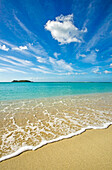 A tropical shoreline in the Caribbean, Petite Carenage Bay, on the north coast of Carriacou Island, looking towards Union Island (in the Grenadines) in the distance; Carriacou Island, Grenada, Caribbean Islands