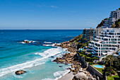 Beachfront buildings along the Atlantic Ocean at Clifton Beach; Cape Town, Western Cape, South Africa