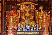 Statues of the temple deities in the main hall at Chenghuang Temple, the City God Temple, near Yuyuan Garden, Shanghai, China.; Shanghai, China.