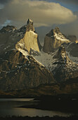 Granite mountain walls at dawn.; TORRES DEL PAINE NATIONAL PARK, CHILE.