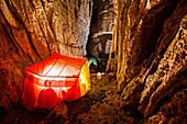 An expedition team camps inside Dark Star, a limestone cave system in Uzbekistan's Boysuntov Range.; Uzbekistan.