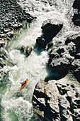 An aerial view of a kayaker on the Middle Fork of the Feather River.; Feather River, California.