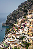 Stone buildings and terraces on the cliffside in the town of Positano along the Amalfi Coast; Positano, Salerno, Italy