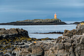 Lighthouse on the town of Flatey, Iceland, a former fishing village that is now a tourist destination; Flatey, Iceland