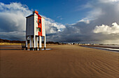 An old wooden lighthouse on the beach at Burnham-on-Sea; Somerset, England, Great Britain