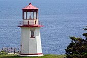 Historic lighthouse, 1874, at Cap Blanc on the Gaspe Peninsula.; Cap Blanc, Gaspe Peninsula, Quebec, Canada.