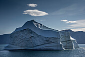 Iceberg floating on the Franz Joseph Fjord, just off the coast of Greenland; Greenland