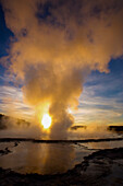 Backlit view of Great Fountain Geyser, Lower Geyser Basin, Yellowstone National Park, Wyoming, USA; Wyoming, United States of America