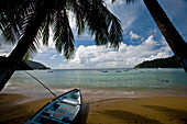 Boat on a sandy beach at Charlotteville, Tobago; Charlotteville, Tobago, Republic of Trinidad and Tobago