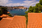 Tiled roof and harbour of Collioure; Collioure, Pyrenees Orientales, France
