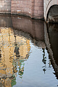 A Building Reflected In The Griboyedov Canal; St. Petersburg Russia