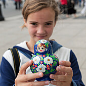 A Girl Holds A Matryoshka Nesting Doll; St. Petersburg Russia