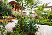 A Tourist Enjoys A Small Resort At Santa Teresa And Mal Pais (Malpais) On The Nicoya Peninsula; Puntarenas Province, Costa Rica