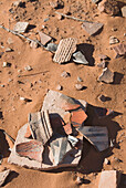 Arizona, Navajo Tribal Park, Monument Valley, Mystery Valley, Broken pieces of ancient ceramic pottery.