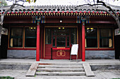 Front Entrance To A Building With Red Architectural Detail; Beijing China