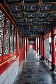 Colourful Ornate Building With Red Pillars; Beijing China