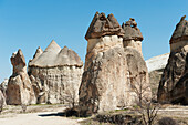 Rock Formations Against A Blue Sky; Nevsehir Turkey