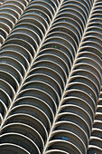 Low Angle View Of A Building With Curves To Give A Bumpy Facade; Chicago Illinois United States Of America