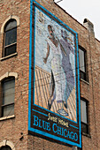 Low Angle View Of A Painted Sign For Sweet Home Blue Chicago On The Side Of A Brick Building; Chicago Illinois United States Of America