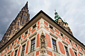 Czech Republic, Low angle view of corner of building and towers from two other buildings; Prague