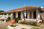 Cuba, Old timber house on the waterfront; Cienfuegos