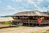 Thailand, Chiang Mai, Building with thatched roof in Chinese village; Shandicun