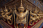 Golden Garudas Lined Up Around The Main Temple; Bangkok, Thailand