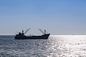 Cargo Boats Under Way On The Open Sea; Turkey