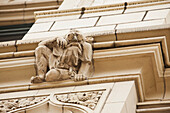 Close Up Of A Stone Sculture On The Side Of A Building; Toronto, Ontario, Canada