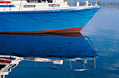 Boat Reflected in Water