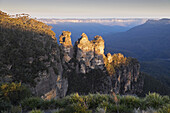 Three Sisters rock formations at sunset in the Blue Mountains National Park in New South Wales, Australia