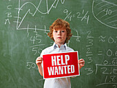 Boy Holding Help Wanted Sign