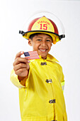 Boy Dressed as Firefighter