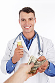 Doctor Exchanging Pills For Money