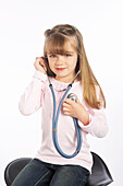 Little Girl Holding Stethoscope