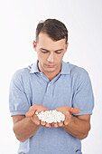 Man With a Handful of Pills