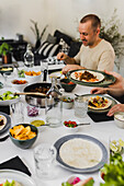 Group of friends having Mexican food at home