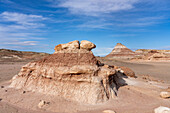 Eroded formations in the colorful bentonite clay hills of the Morrison Formation in the Caineville Desert near Hanksville, Utah.