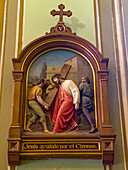 The Fifth Station of the Cross in the aisle of the ornate Cathedral of the Immaculate Conception in San Luis, Argentina.