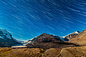 The stars setting into the west over the Columbia Icefields and Athasbasca (left) and Stutfield (right) glaciers, and Snowdome peak. I shot this Sept 6 under very clear skies and a bright waxing gibbous Moon off frame at left. I shot this from the moraine at the upper parking lot.