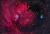 This is the nebula rich region in the constellation of Monoceros the Unicorn with the dark Cone Nebula (left of centre) and the small V-shaped and bright Hubble’s Variable Nebula at bottom, a reflection nebula that varies in form and brightness. Above the Cone Nebula is the triangular Christmas Tree Cluster, NGC 2264, here upside down as the bright blue star 15 Mon is the base of the tree. The large region of nebulosity is Sharpless 2-273. The V-shaped dark nebula above centre is LDN 1603.