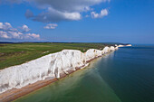 Aerial view of the Seven Sisters chalk white cliffs on a sunny day, South Downs National Park, East Sussex, England, United Kingdom, Europe