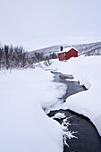 Traditional Sami Cabin (Hytte) in winter, near Lake Eoalbmejavri, Finnmark Plateau, Troms og Finnmark, Norway, Scandinavia, Europe
